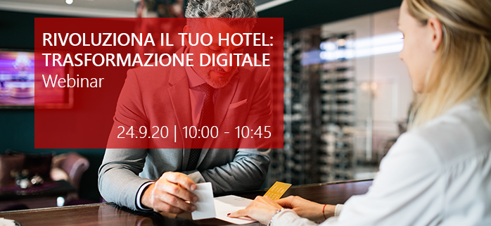 Uomo d'affari che fa il check-in in hotel