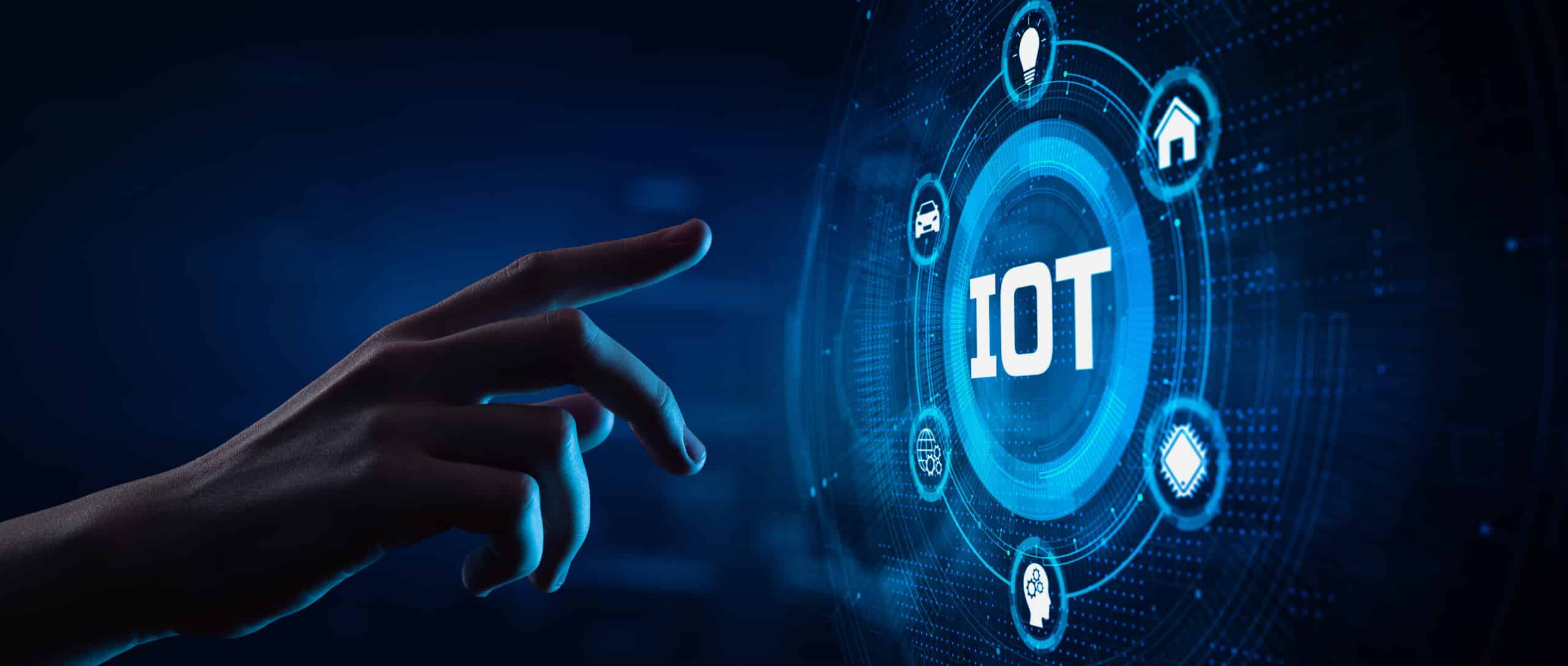 digital hand pointing towards IOT graphic
