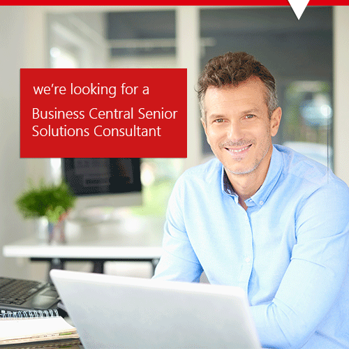 Senior Solutions Consultant smiling in an office